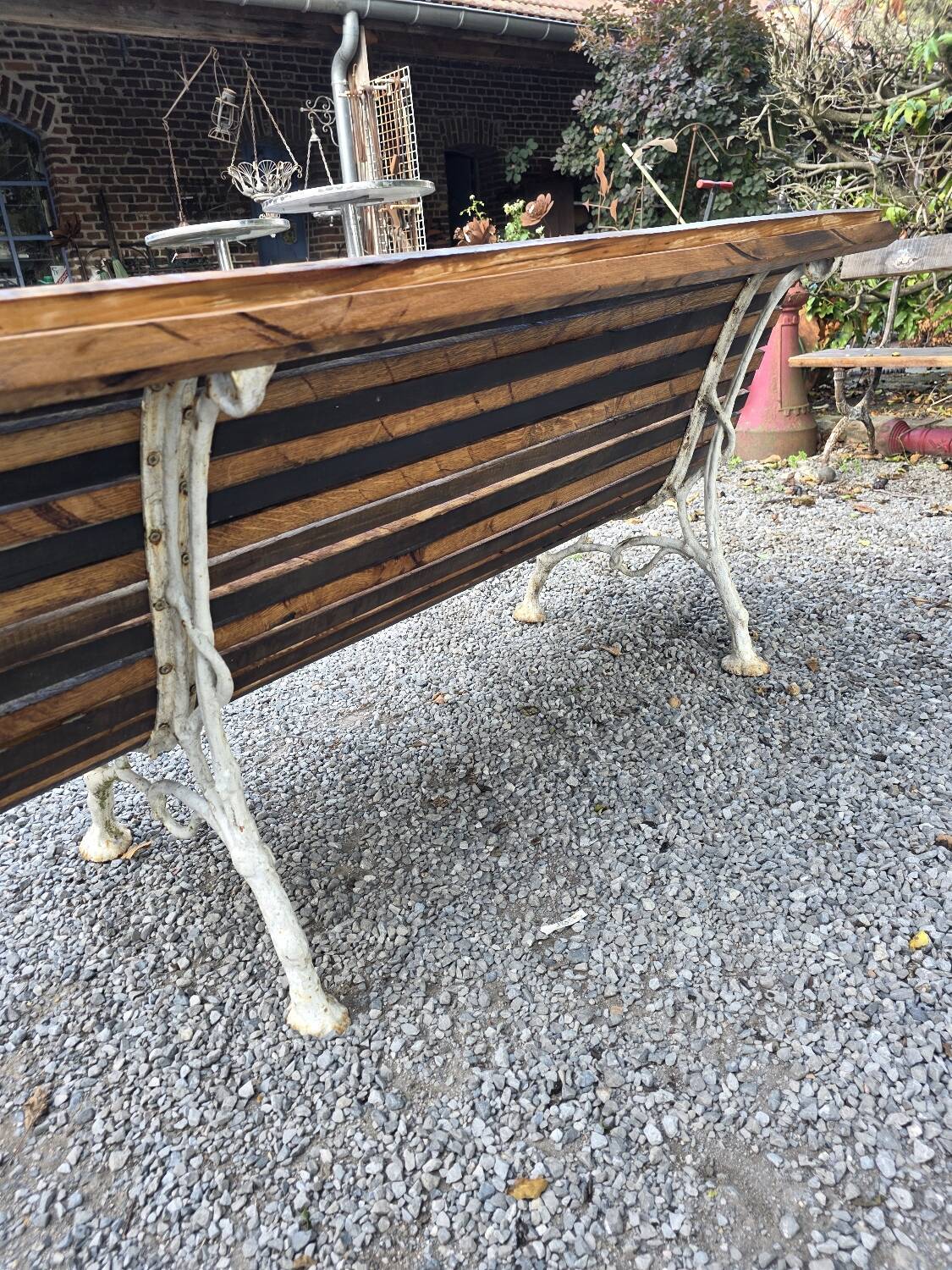 Cast iron and oak slatted garden bench