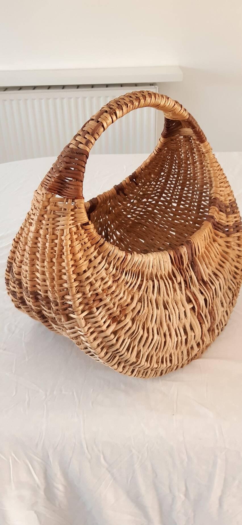 Old banana basket with wicker two colors