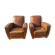 Pair of brown leather club chairs