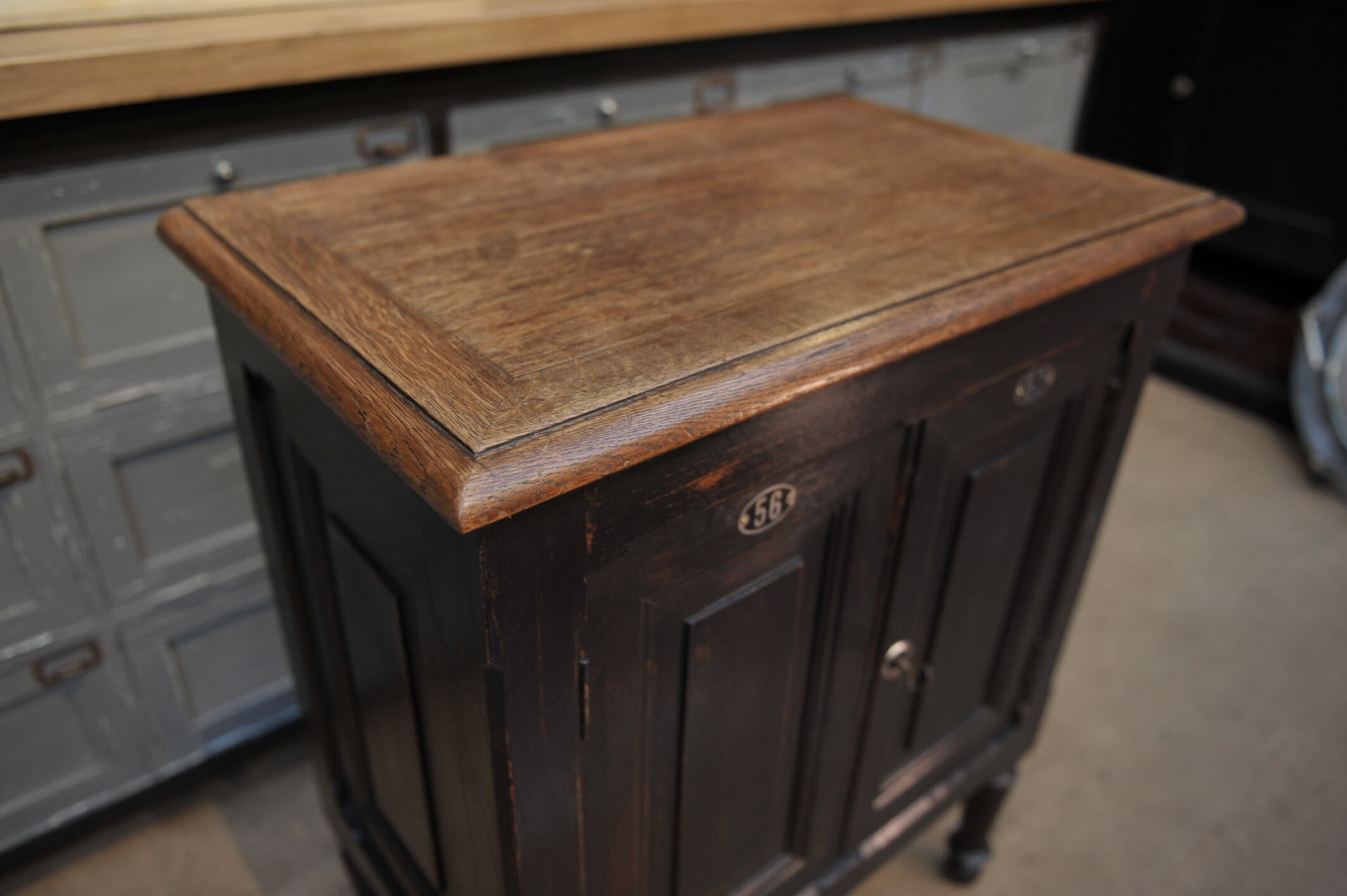 1930s Oak furniture with 2 black patinated doors.