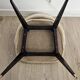 Pair of vintage barrel chairs in boucle fabric with brass splayed legs.
