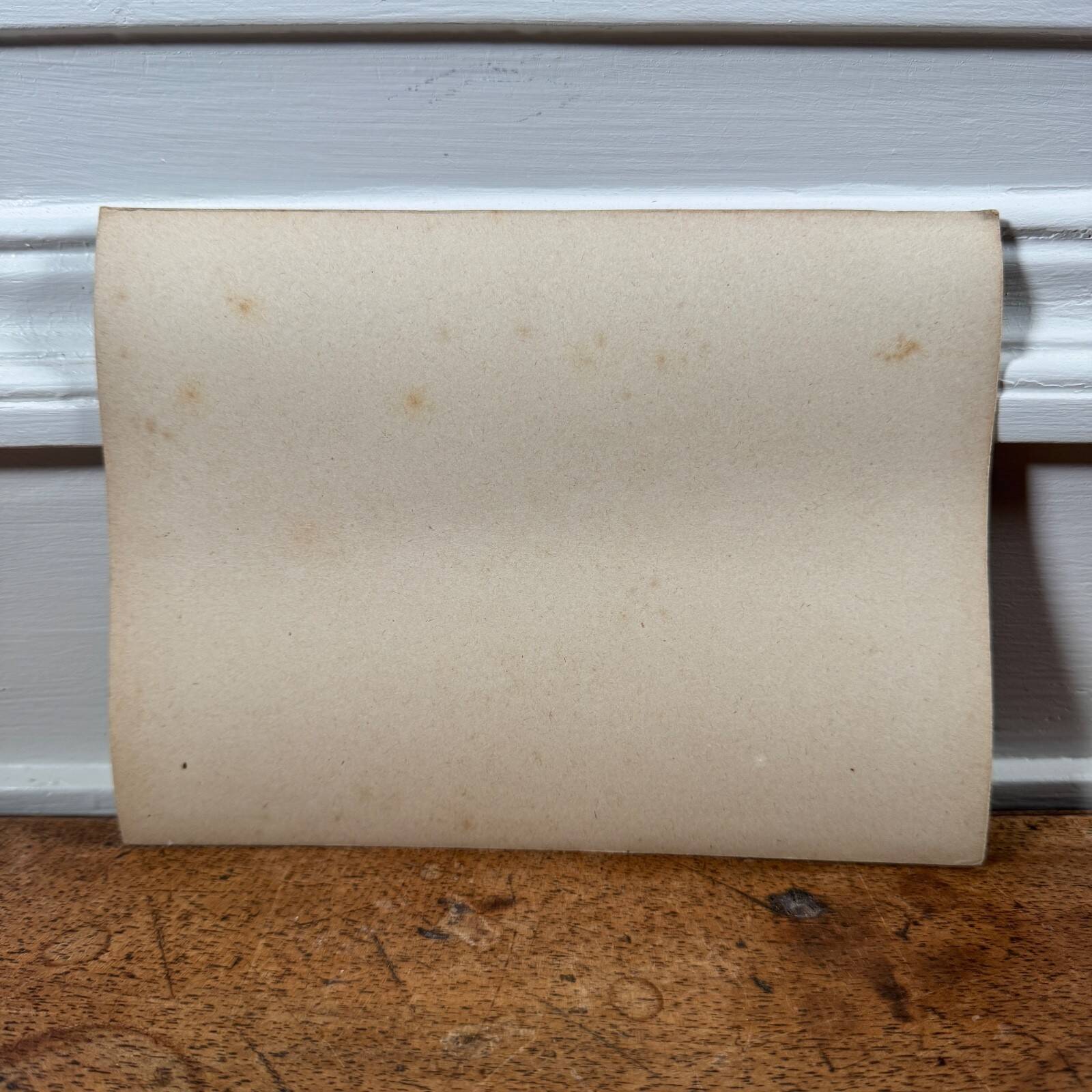 Photo album mounted on cardboard depicting haymaking in the 19th century.