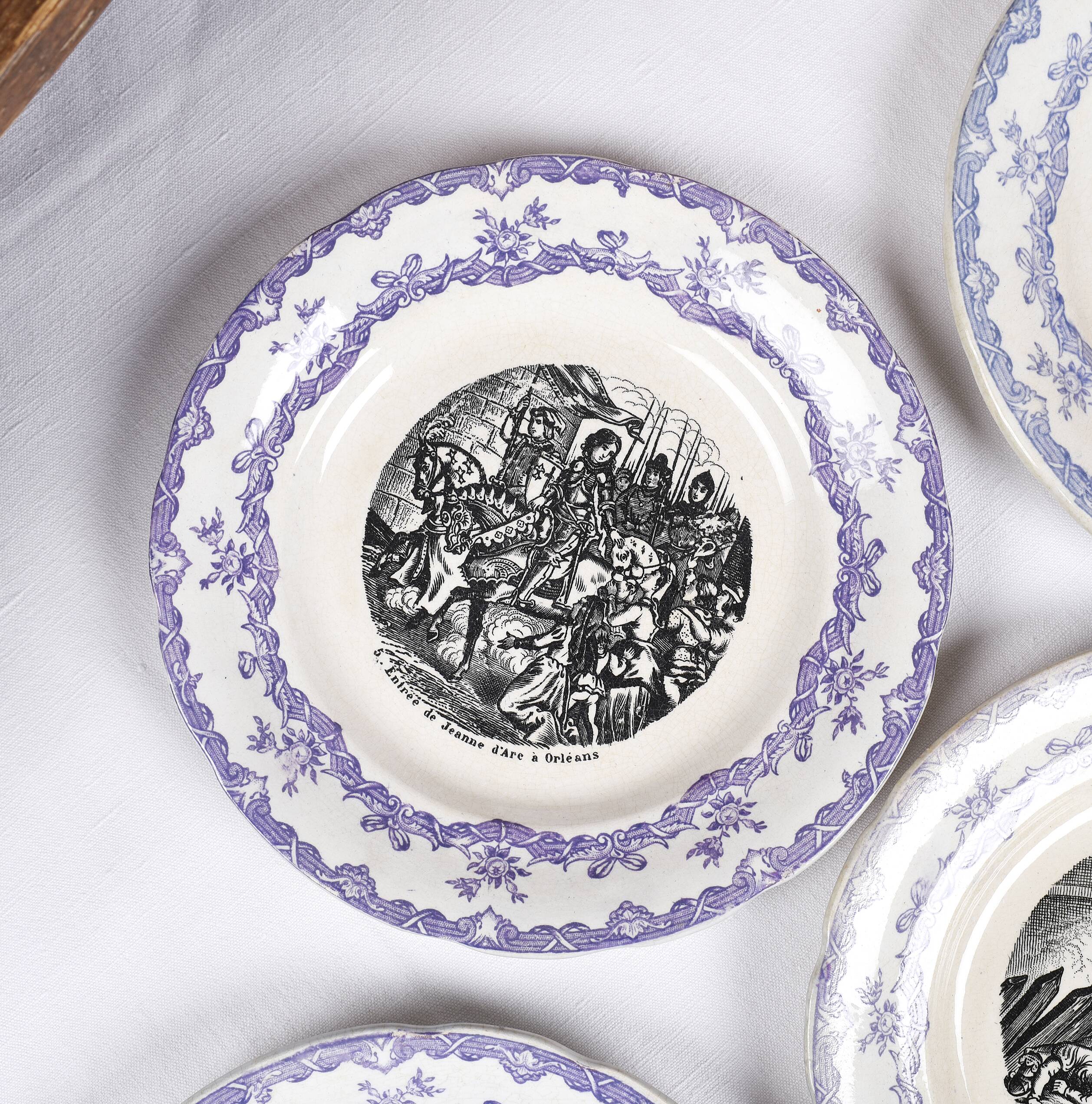Collection of talking plates with Joan of Arc theme, in earthenware from the Choisy le Roi factory