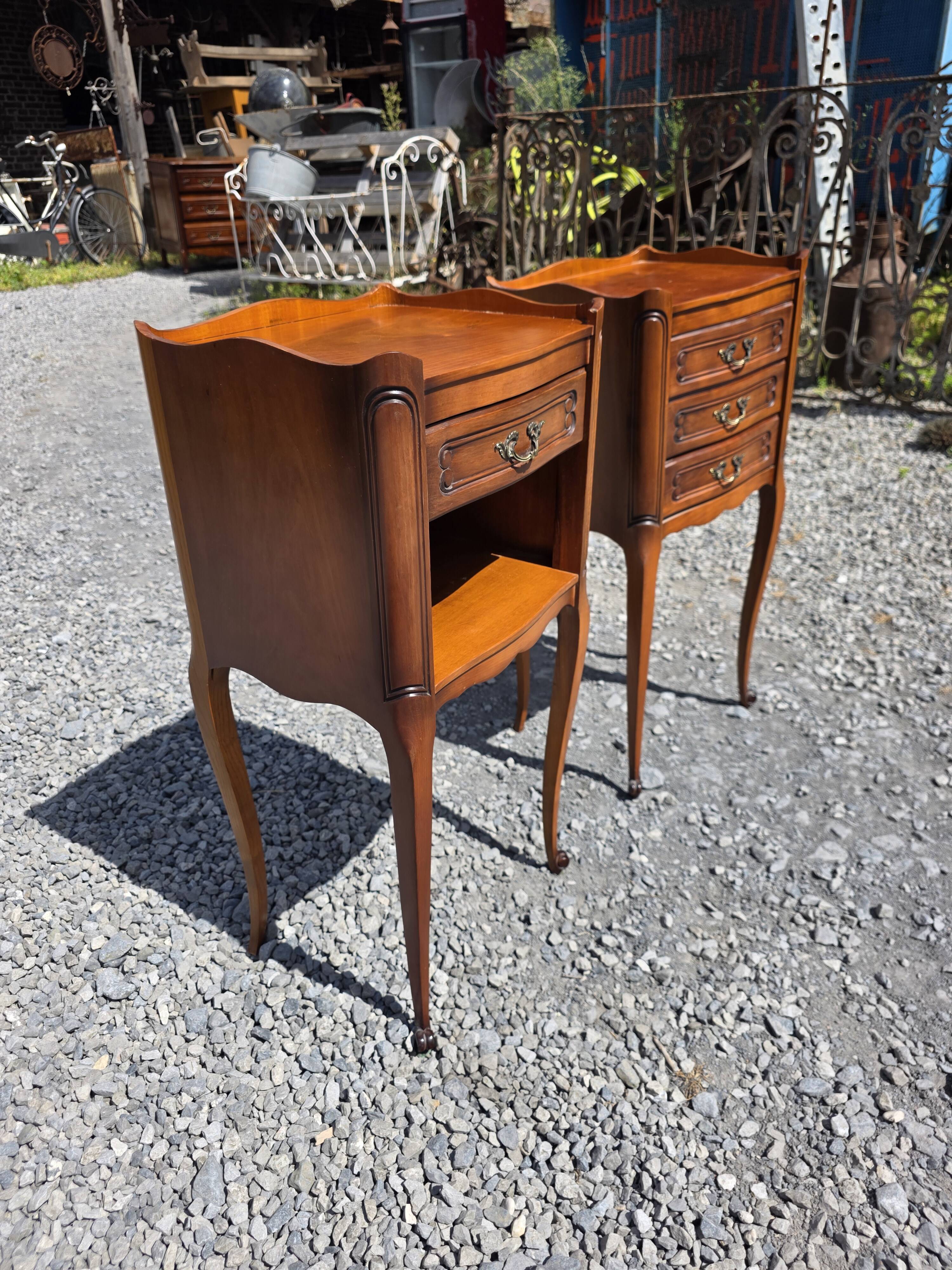 Pair of Louis XV style bedside tables in cherry wood.