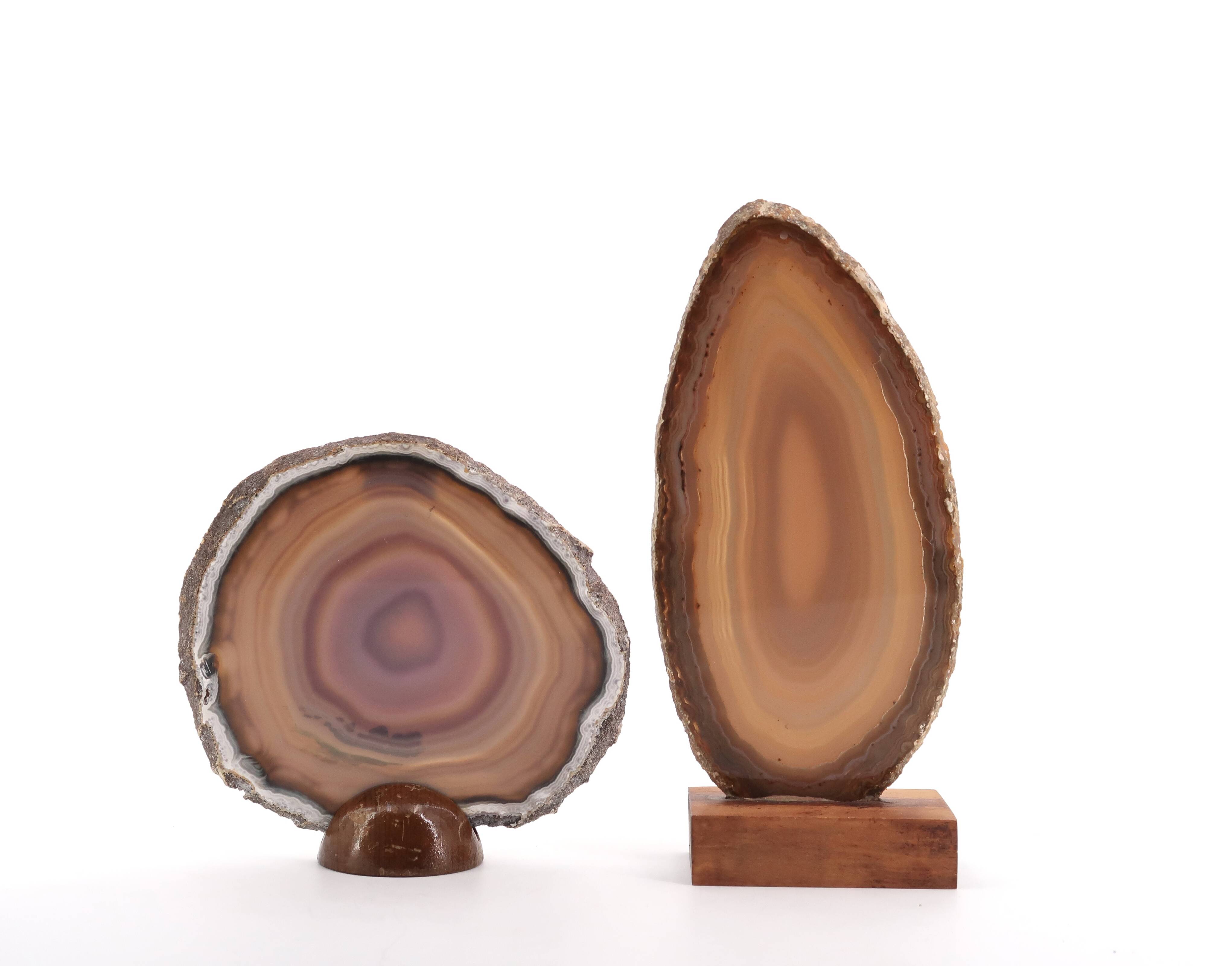 Two agate slices on wooden base, 1970s
