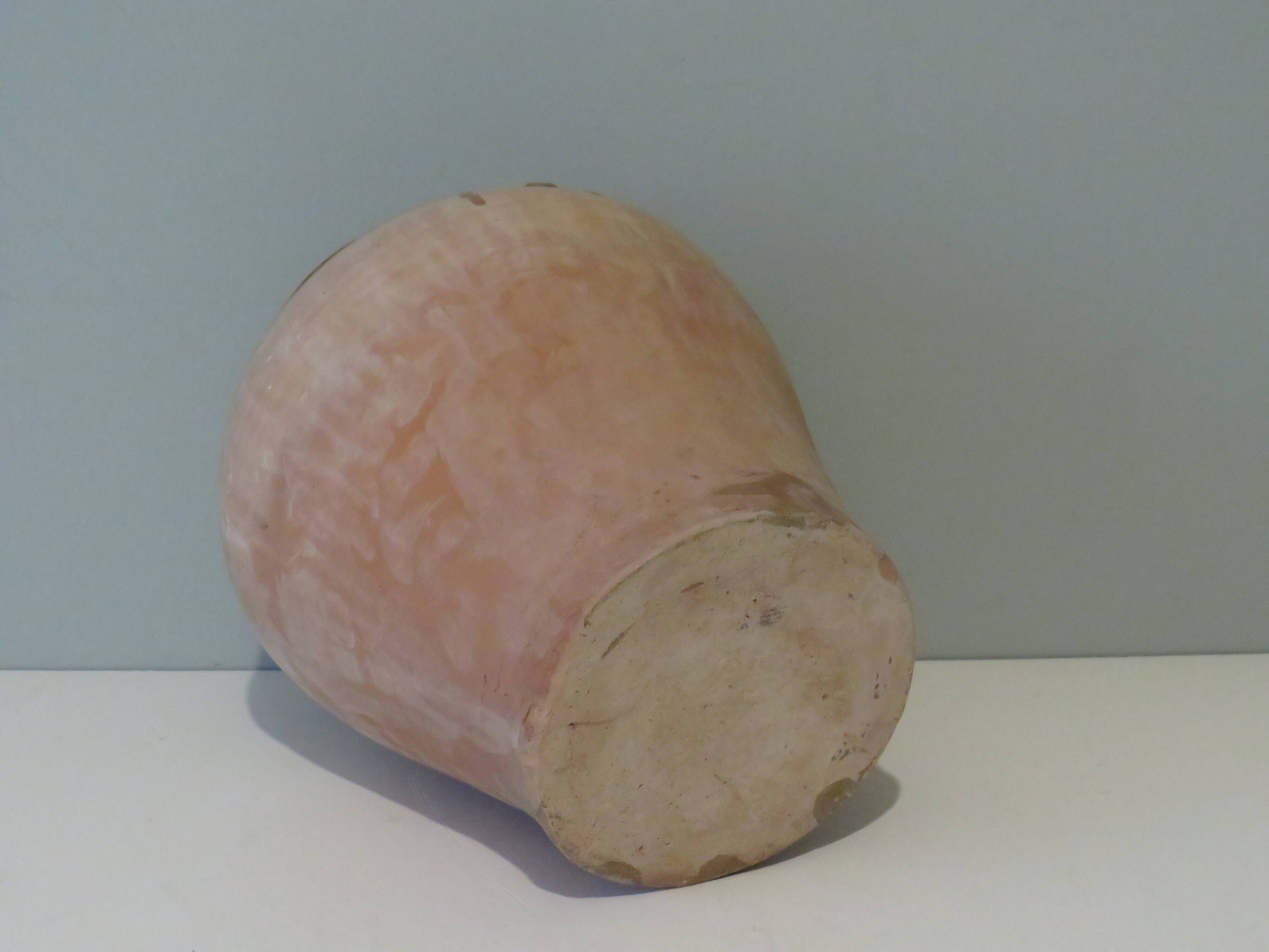 Ancient vase in natural terracotta
