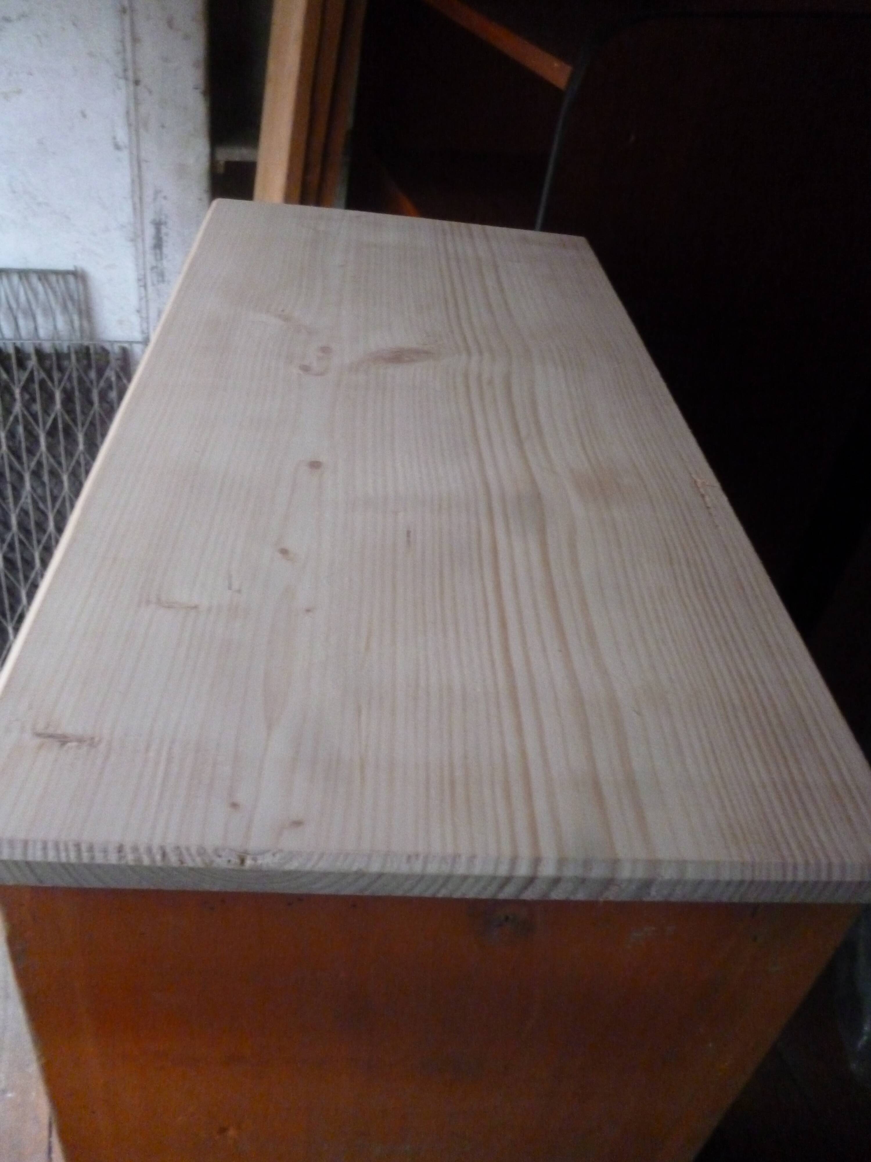 Small piece of furniture with orange patina