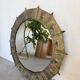 Brutalist round hammered gold metal mirror