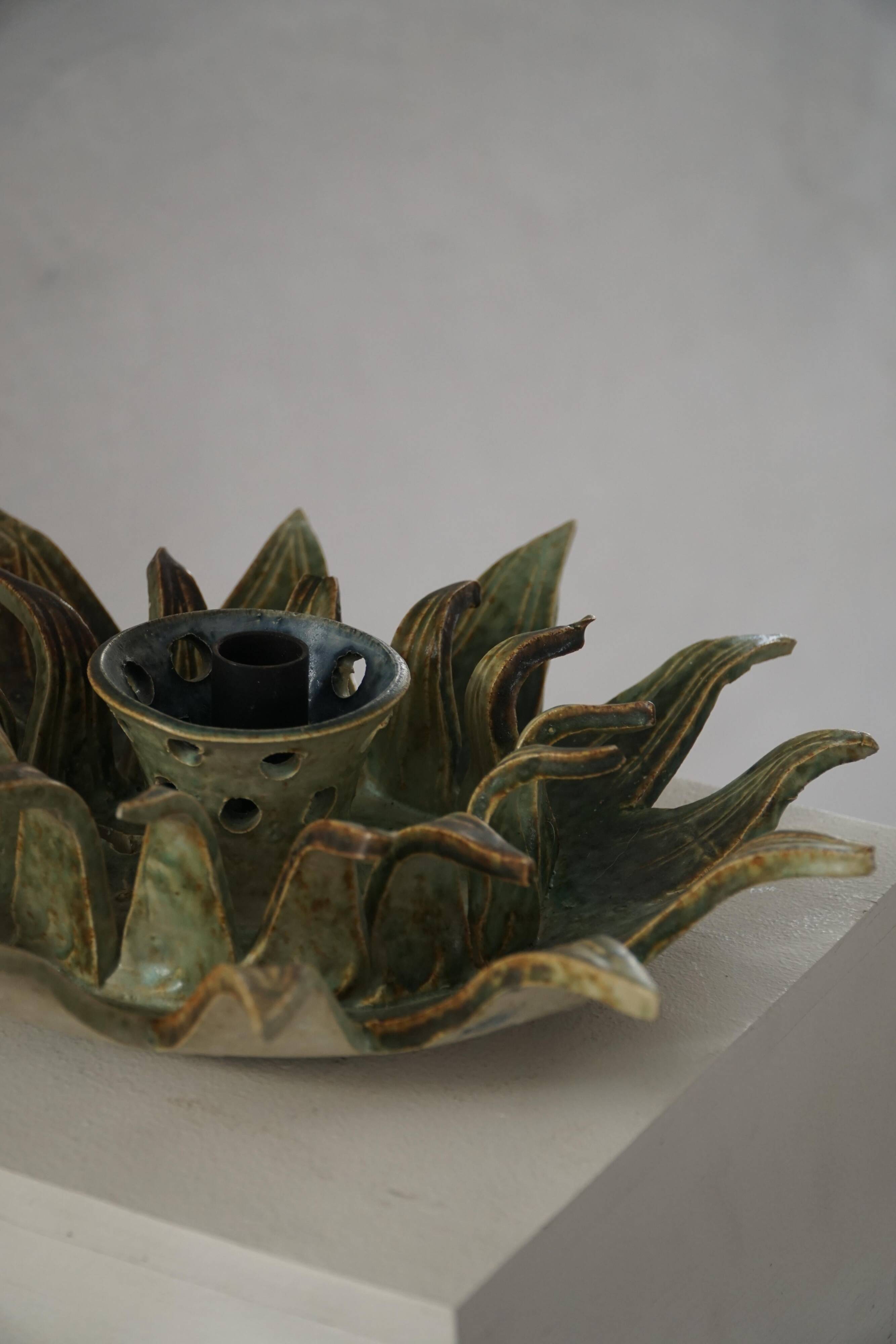 Mid-20th century ceramic sun wall lamp or decorative wall sculpture, 1960s.