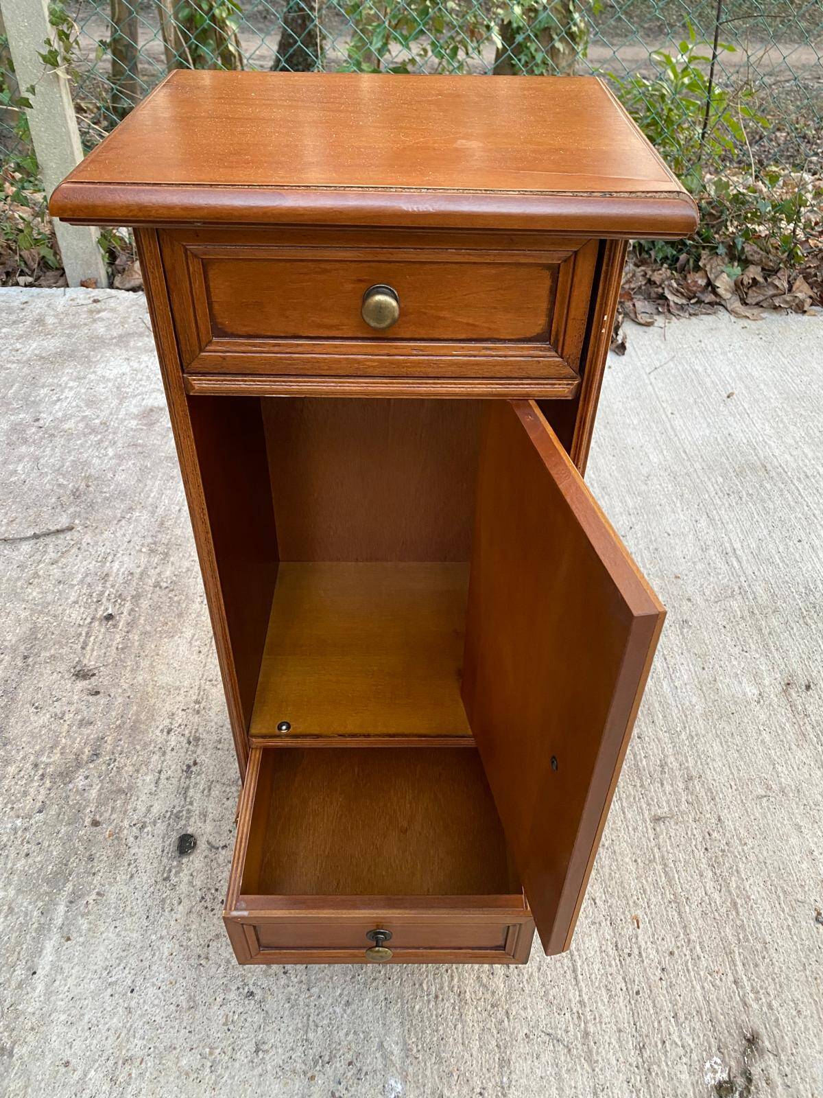 Solid wood bedside table with drawers and door