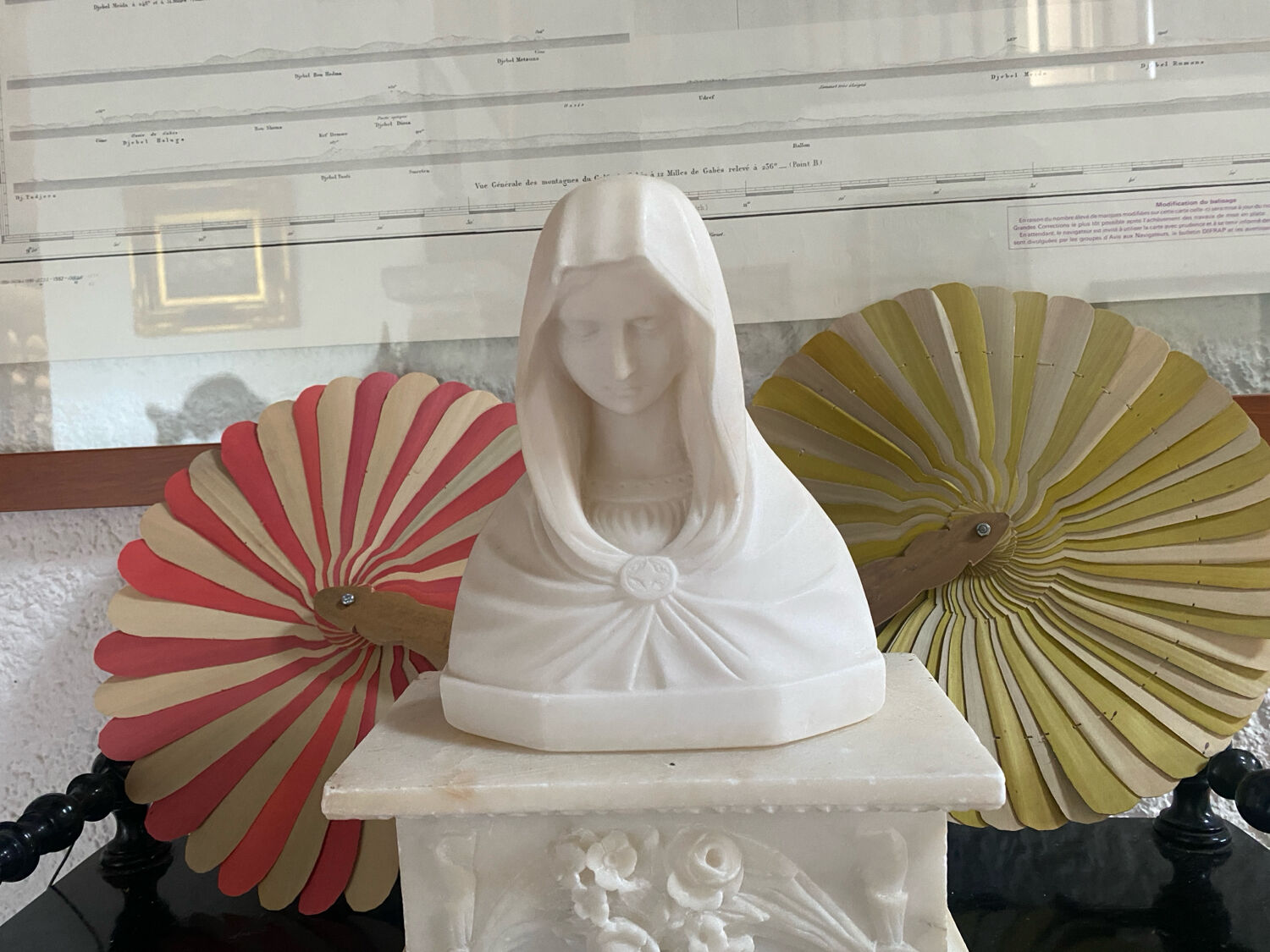 Marble Virgin Mary with her 19th-century base.