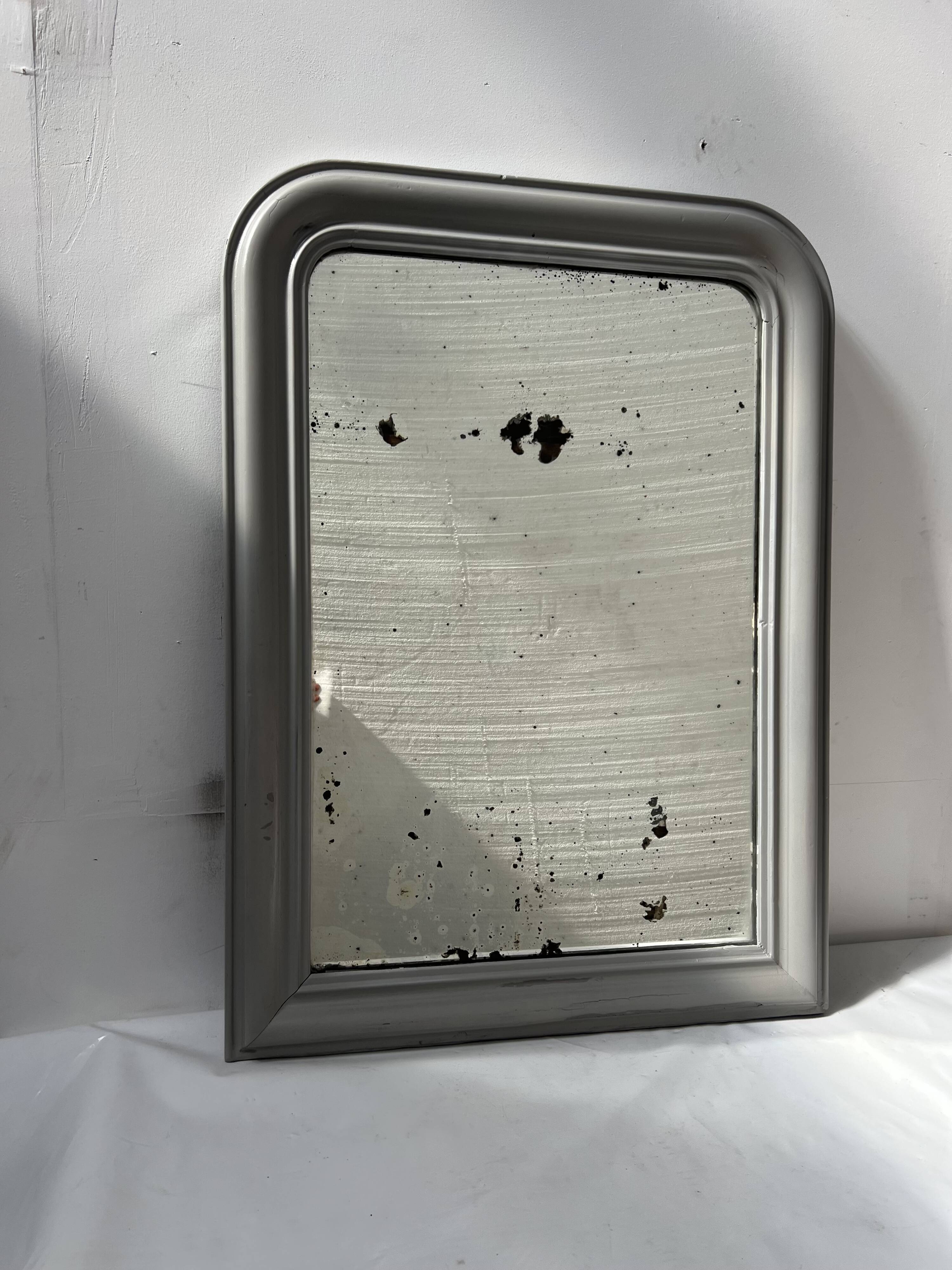 Louis Philippe mirror in wood and patinated stucco, 19th century