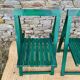Set of 4 green folding chairs