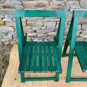 Set of 4 green folding chairs