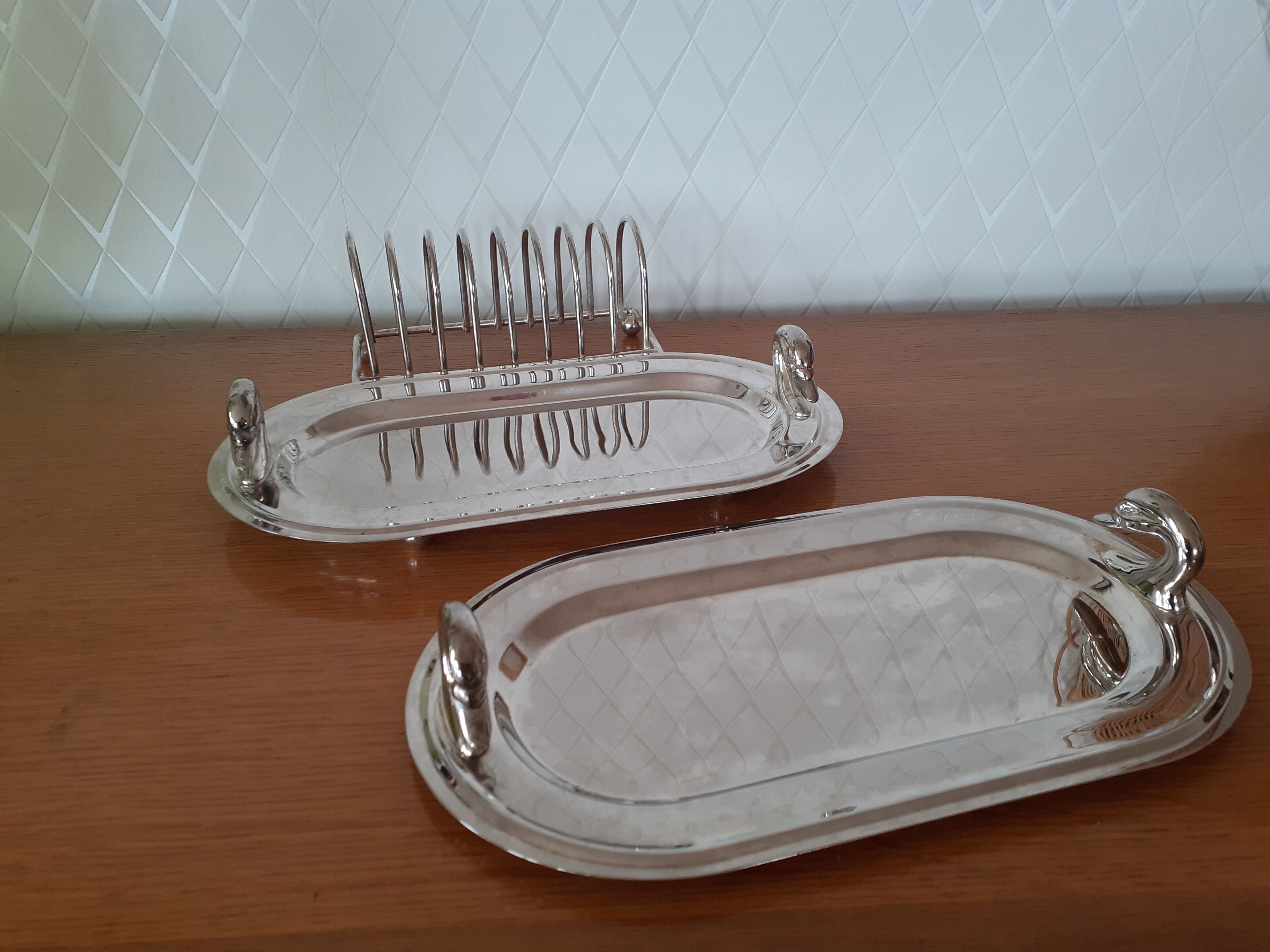 Two foie gras dishes and their toast holder