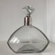 Beautiful cut crystal carafe with its stopper and solid silver setting