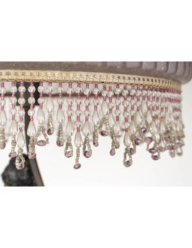 Art Nouveau style lamp with bronze sculpture and glass shade