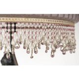 Art Nouveau style lamp with bronze sculpture and glass shade