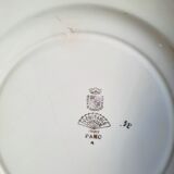 Pitted old flat earthenware plates with gold
