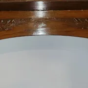 Important architectural fireplace made of solid wood, dating from the 19th century.