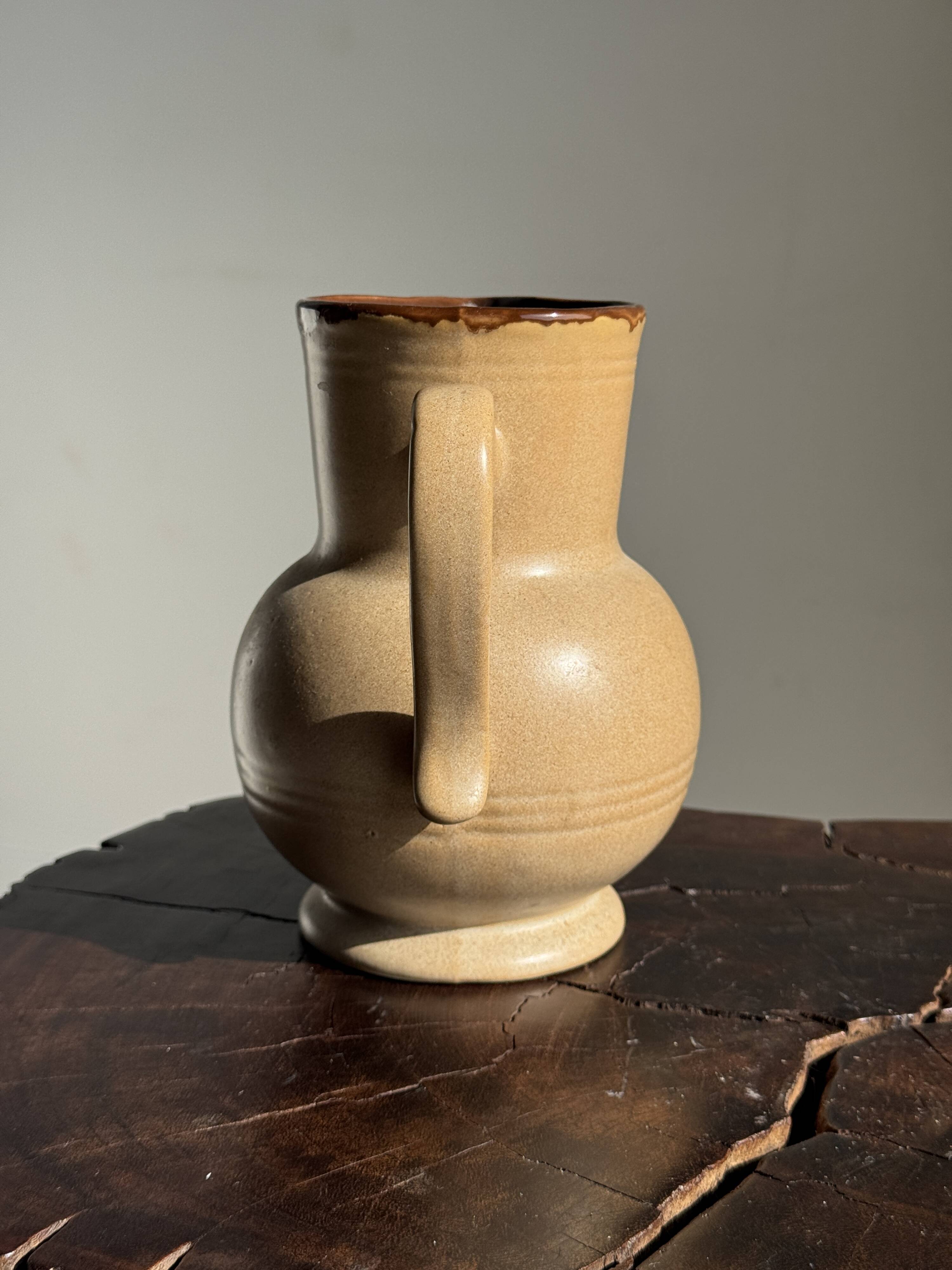 Vintage stoneware round carafe