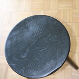 Black tripod wooden stool