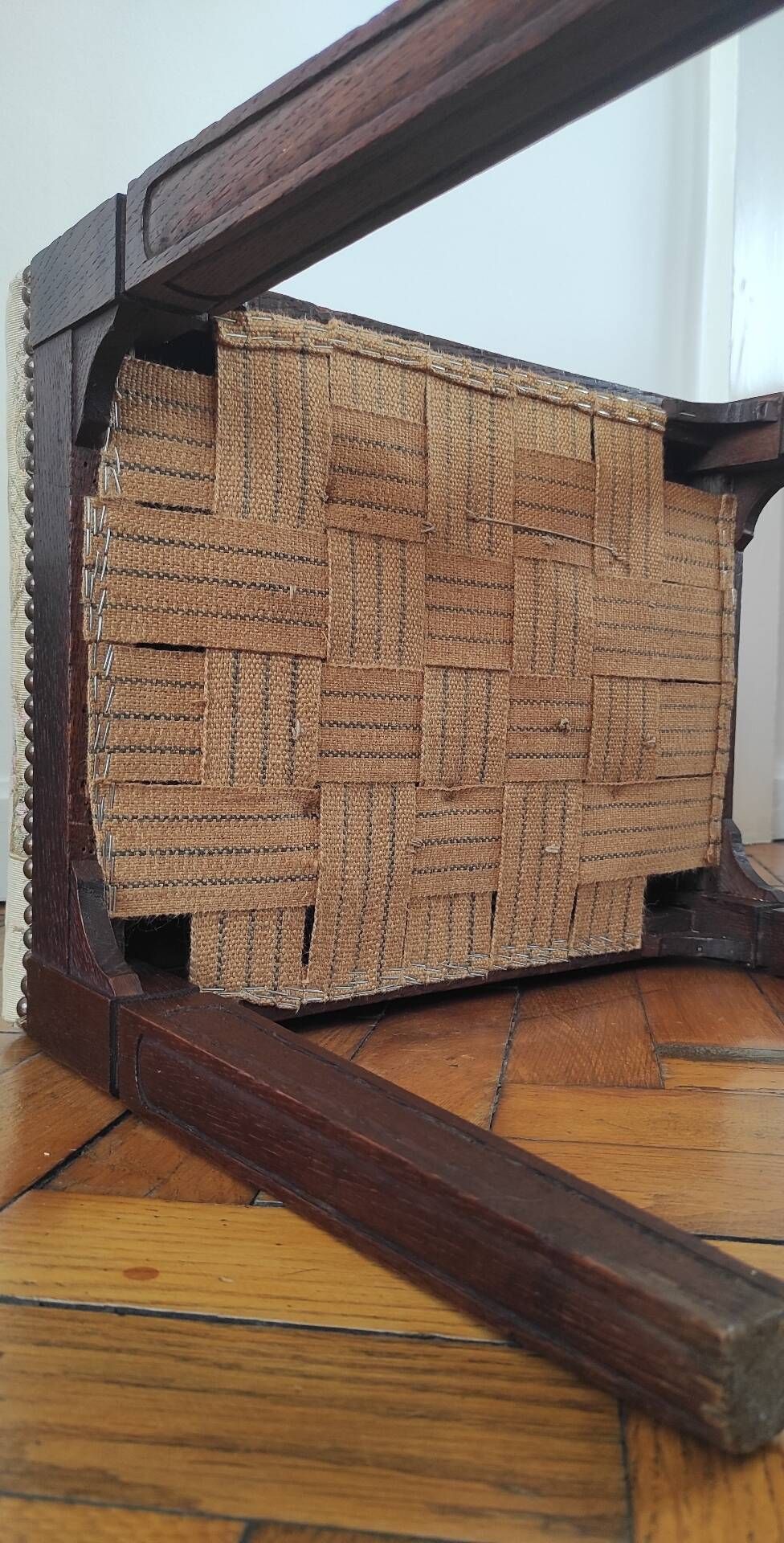 Footrest, vintage stool in solid oak with floral upholstery.