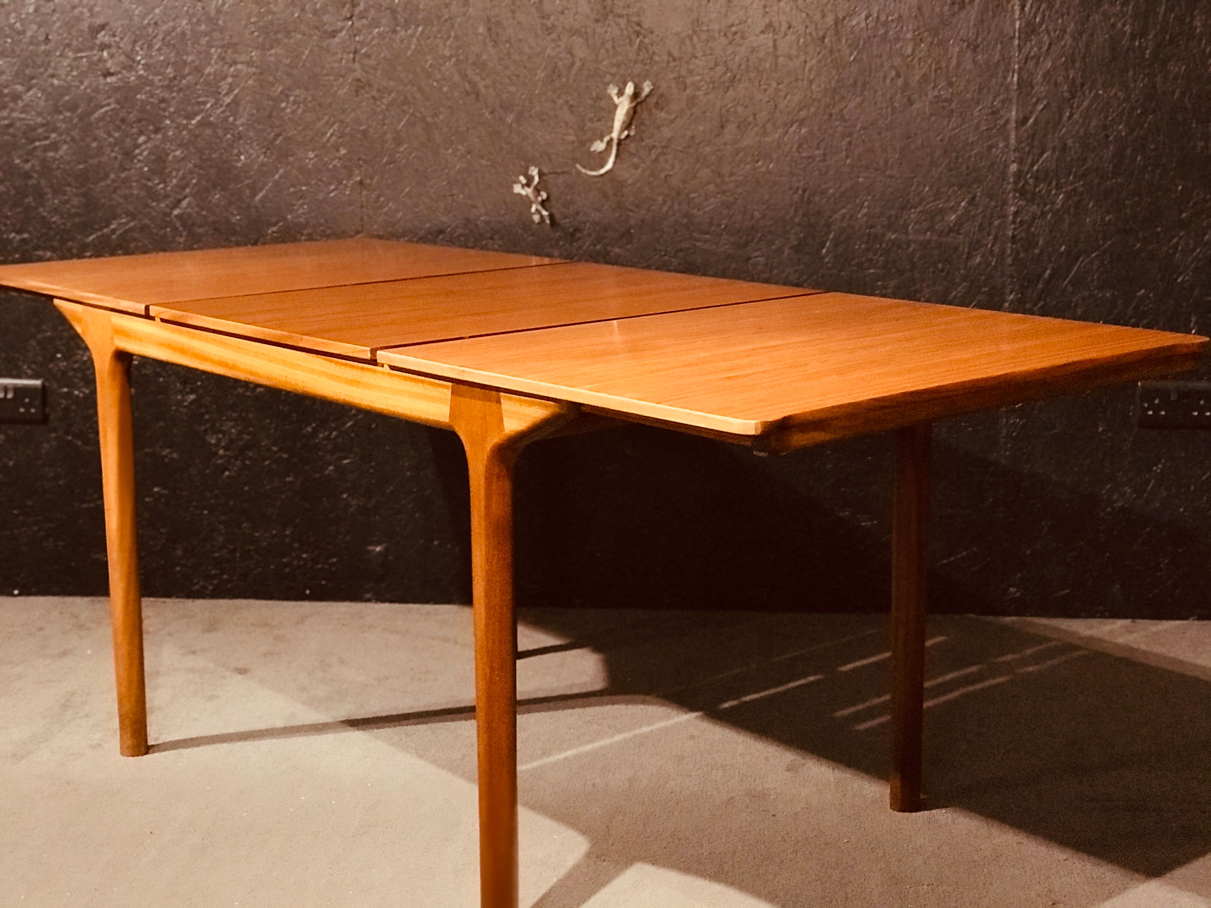 McIntosh extending table designed by Tom Robertson