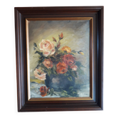Antique oil painting depicting a bouquet of roses