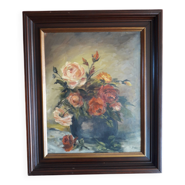 Antique oil painting depicting a bouquet of roses