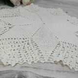 Handmade round placemat in crocheted cotton lace