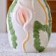 Large slip vase of Arum flowers