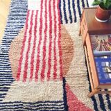 Béni Ouarain rug with stripes and geometric patterns