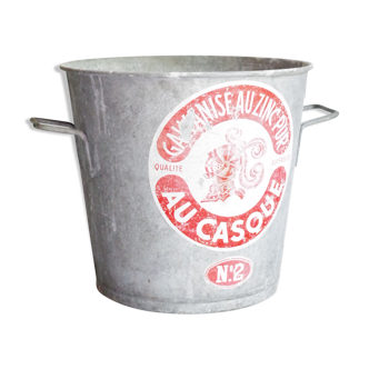 Old zinc bucket label