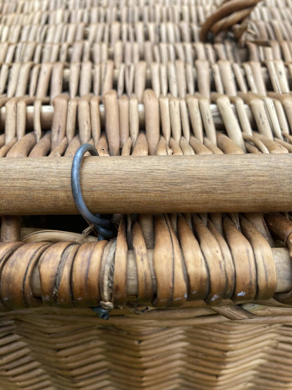Old wicker basket with closure and handle
