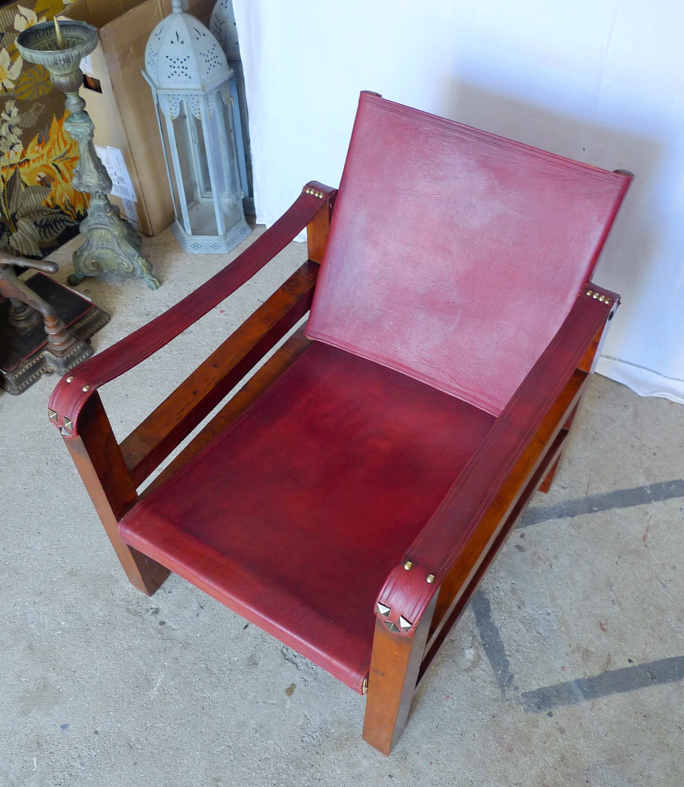 Leather and wood relaxed armchair