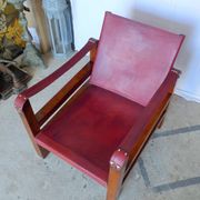 Leather and wood relaxed armchair
