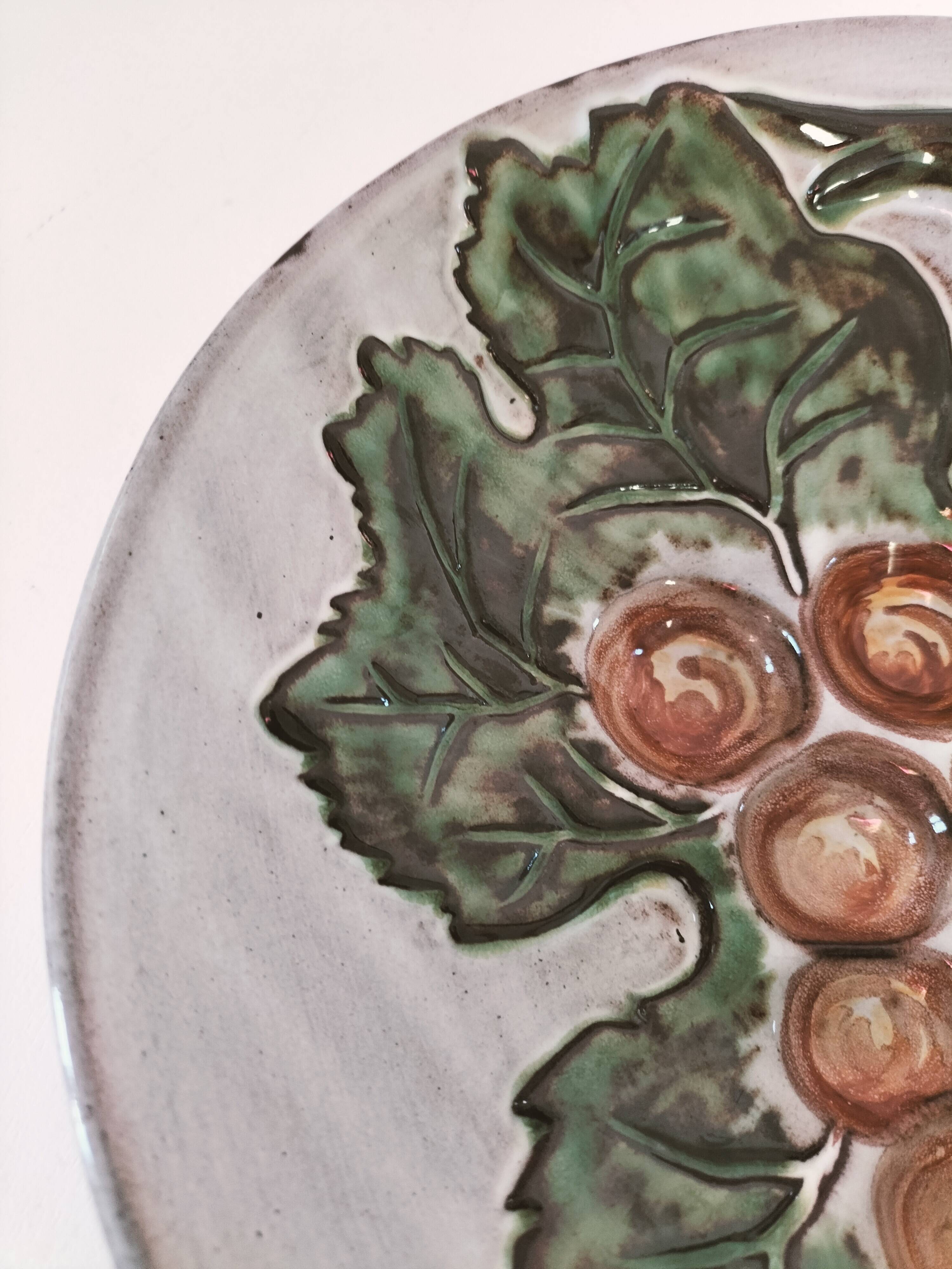 Vintage ceramic bowl – embossed grape pattern in slip style