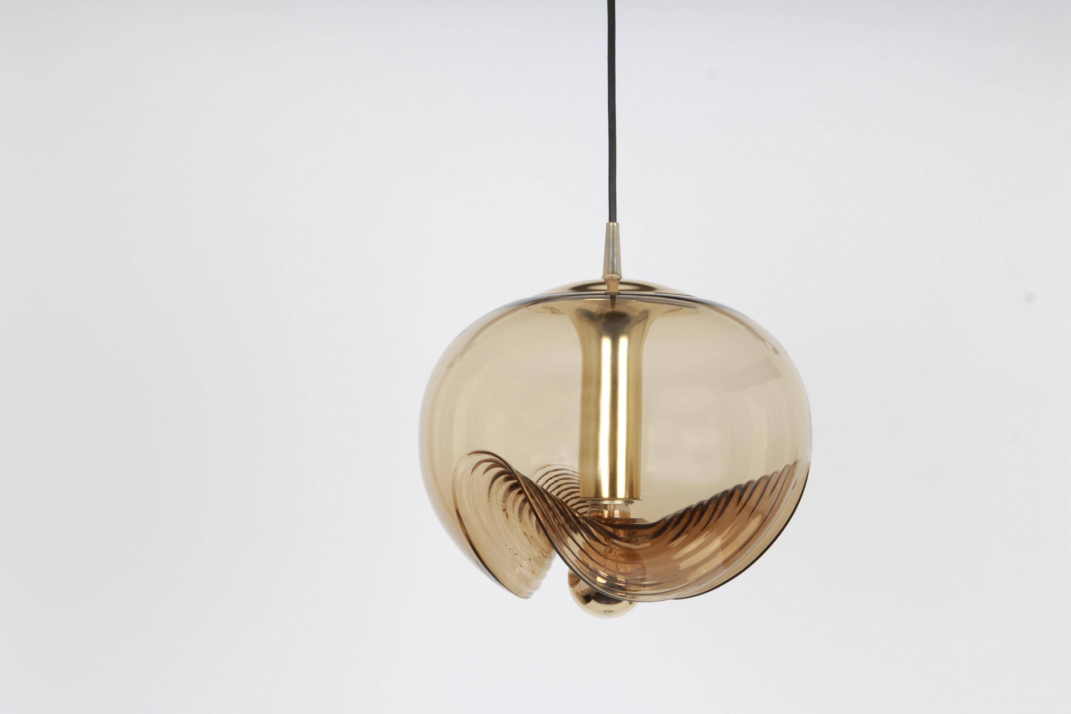 One of the four large smoked glass pendants by Peill & Putzler, Germany, 1970s.