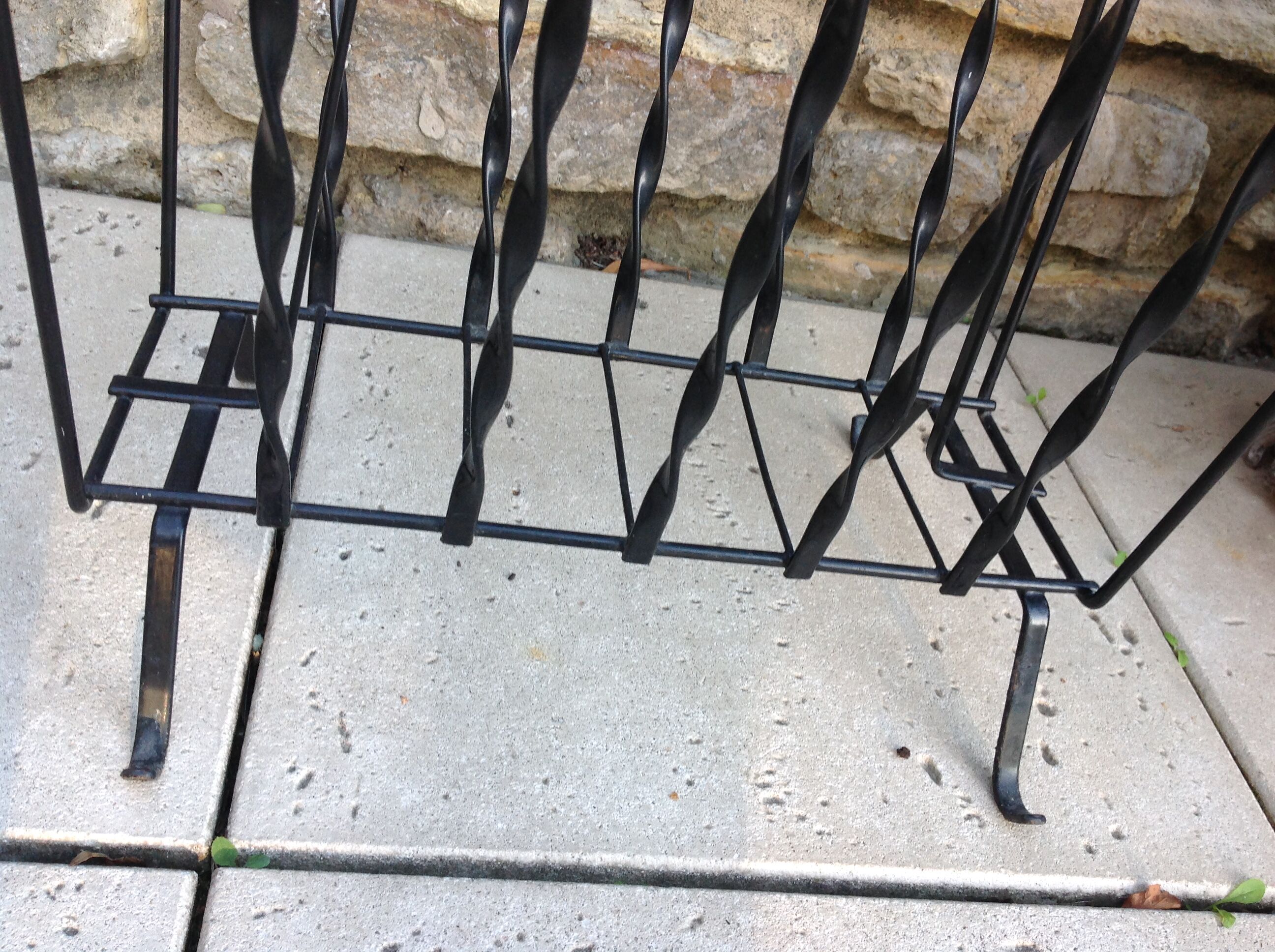 Black metal magazine holder