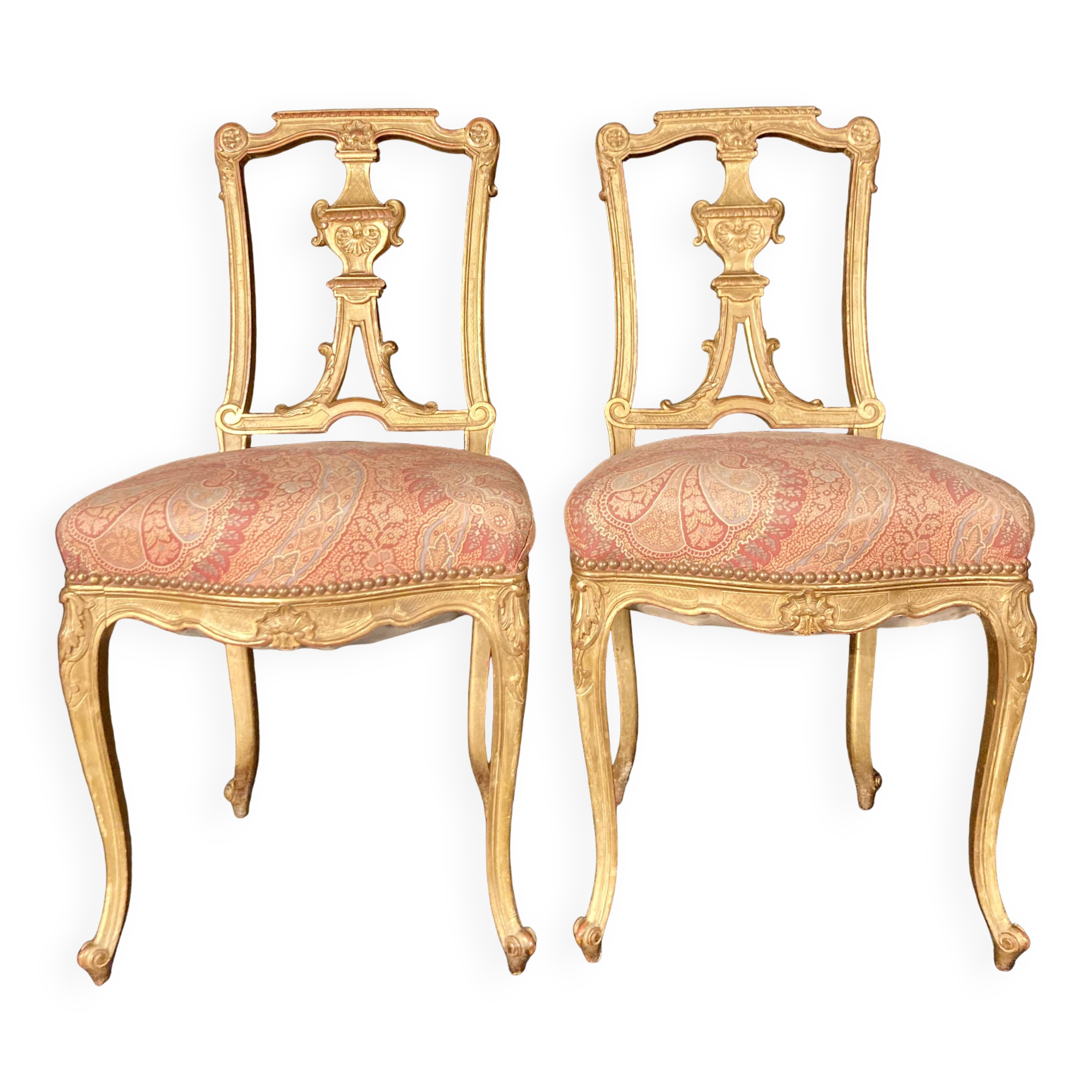 Pair of gilded wooden chairs