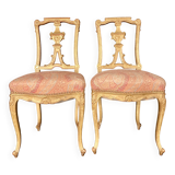 Pair of gilded wooden chairs