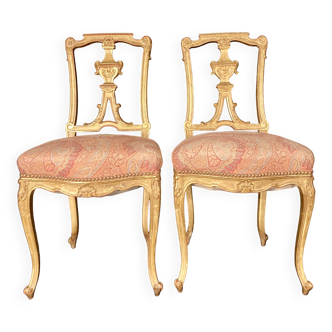 Pair of gilded wooden chairs