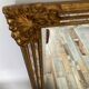 Large Deknudt mirror in gilded wood and glazing beads