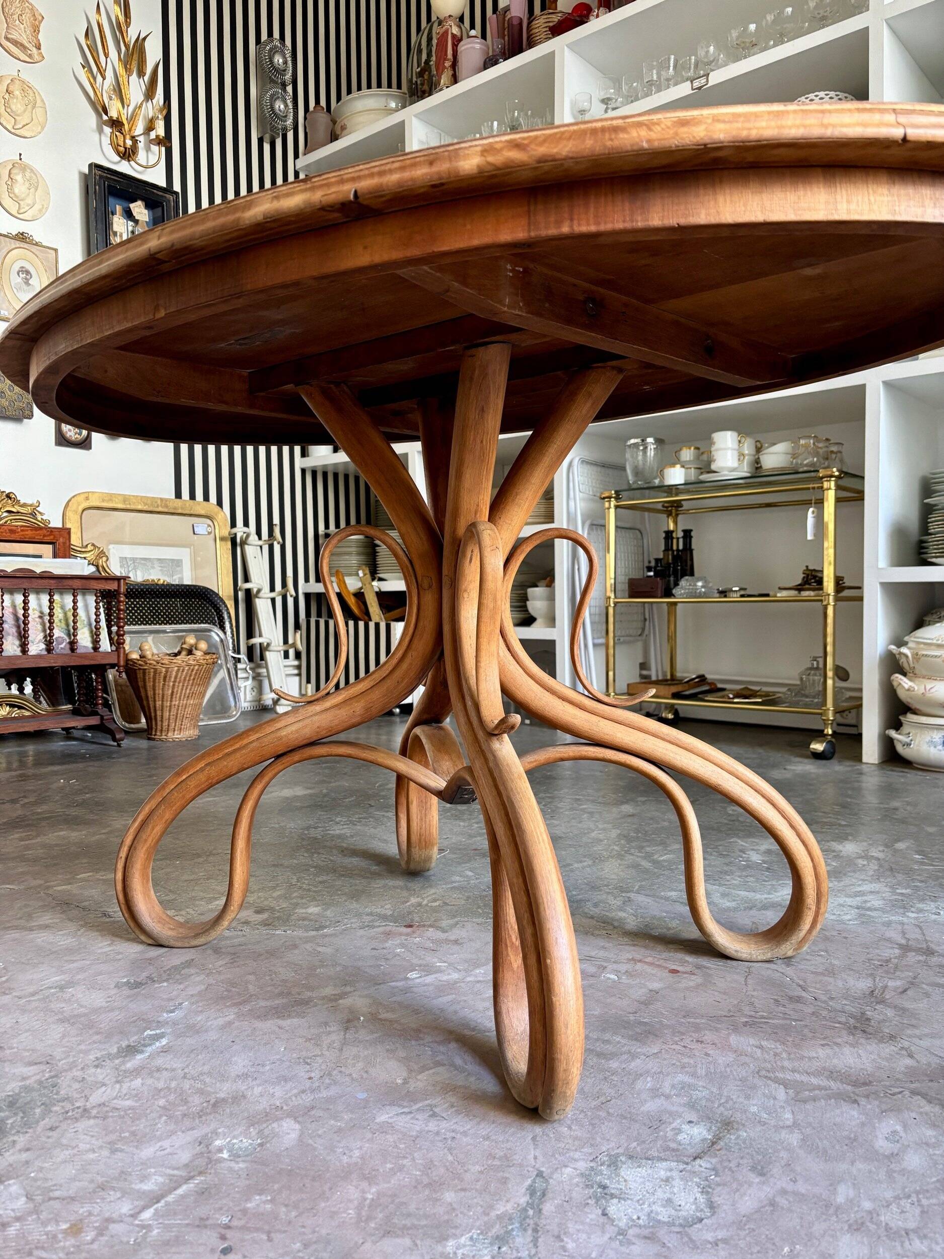 Thonet table no. 3 and 4 bent beech chairs with caning, circa 1890.