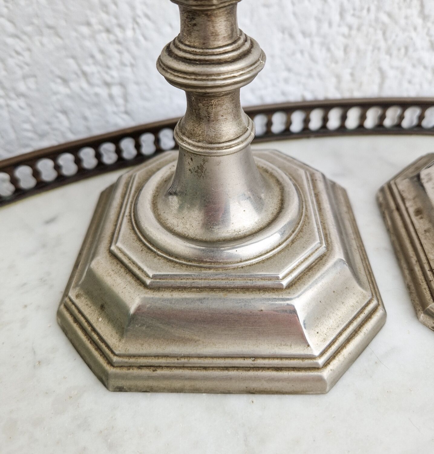 Pair of neo classical style candle holders in silver metal