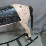Powder pink and black rocking wooden horse