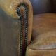 Characterful sheepskin leather club armchair with a luxurious, rustic appearance