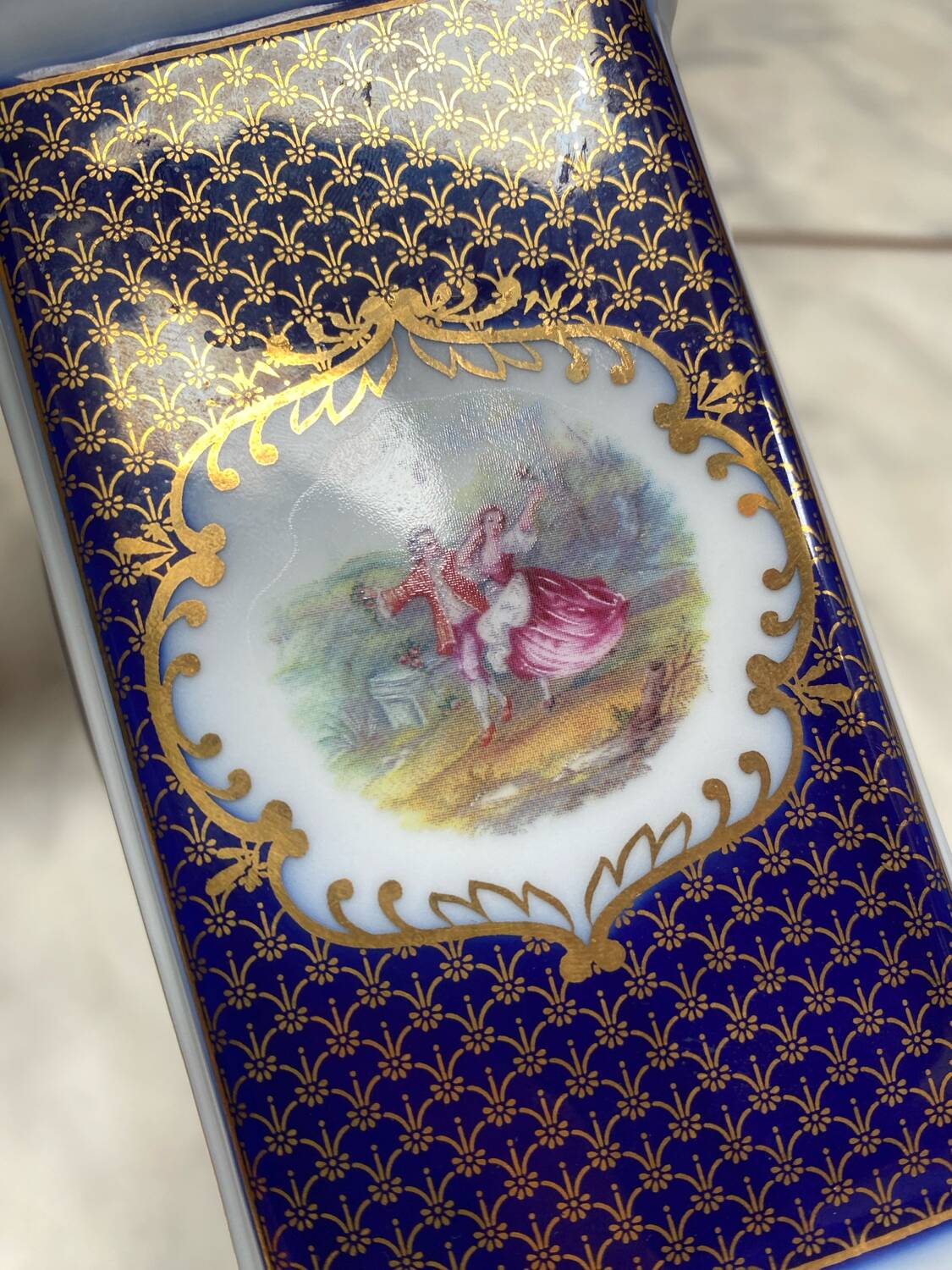 English porcelain clock and candle holders