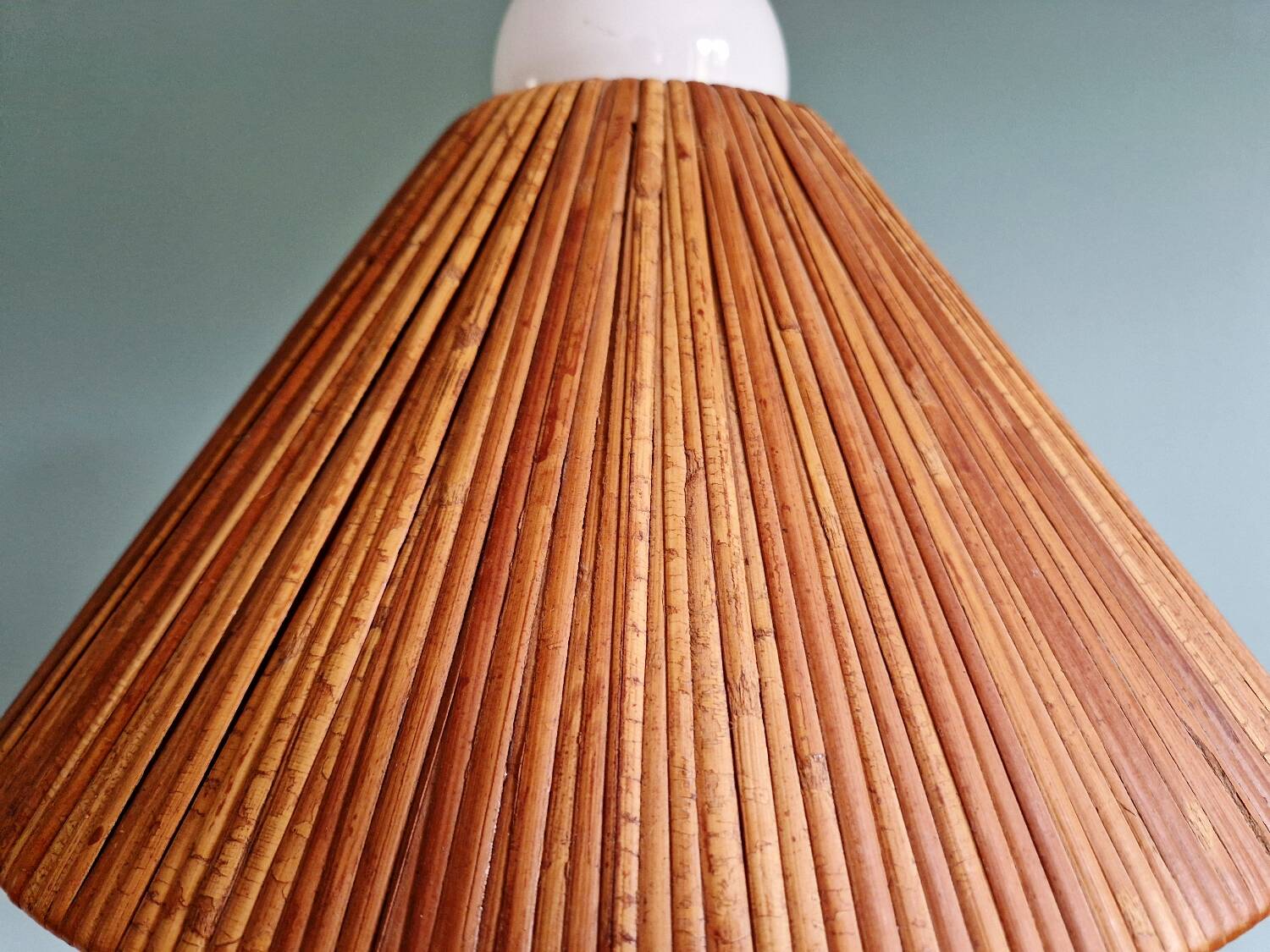 Brass floor lamp with rattan shade, 1950s-60s.